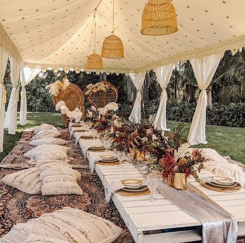 Bohemian outdoor wedding marquee styling