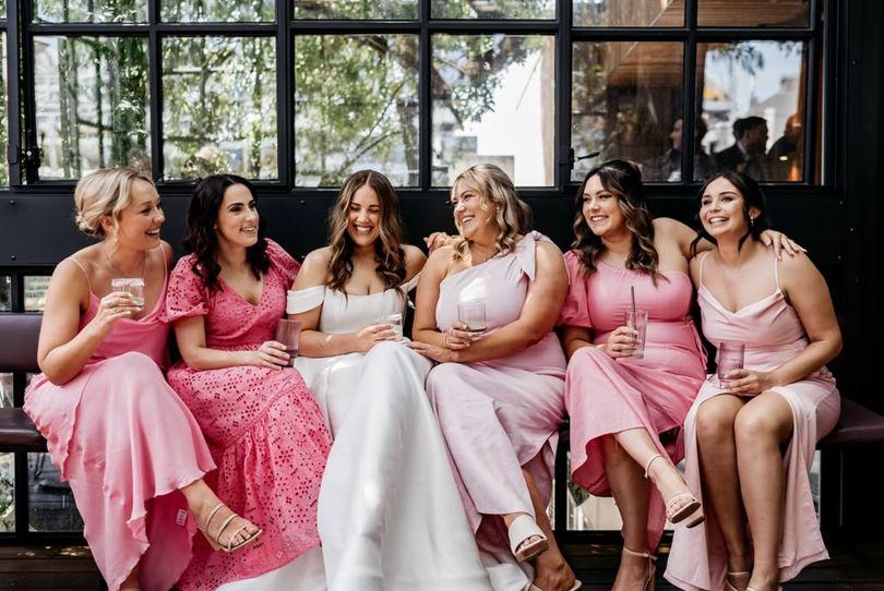 Bridesmaids sitting together