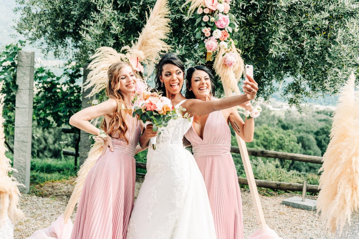 Bridesmaids taking selfie