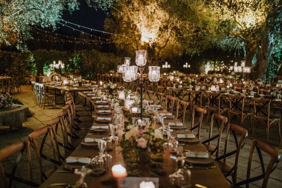 Candlelit garden wedding dinner