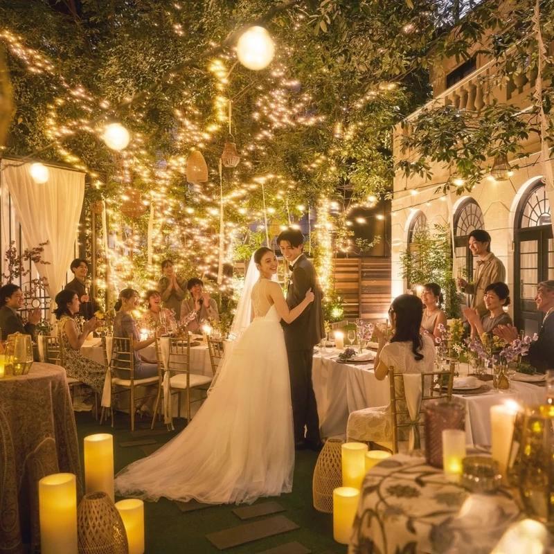 Cozy backyard wedding night celebration