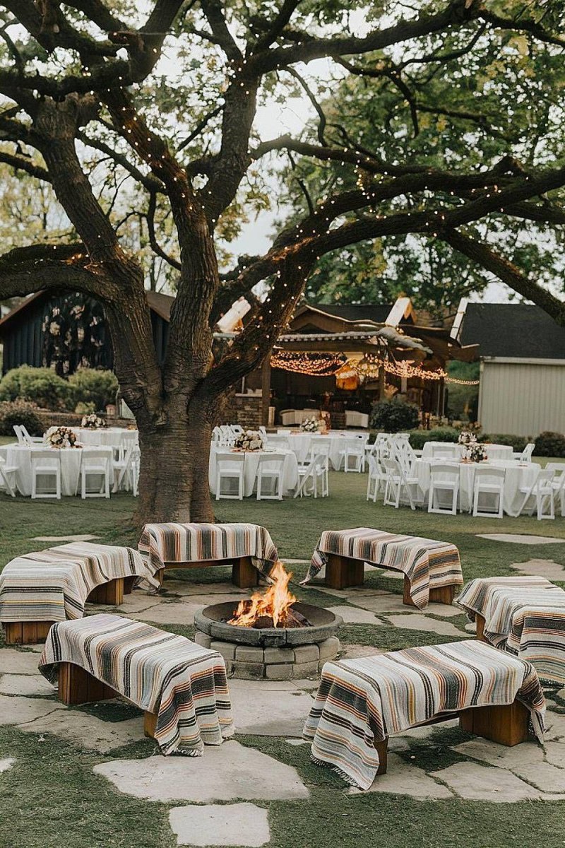 Boho backyard wedding fire pit area