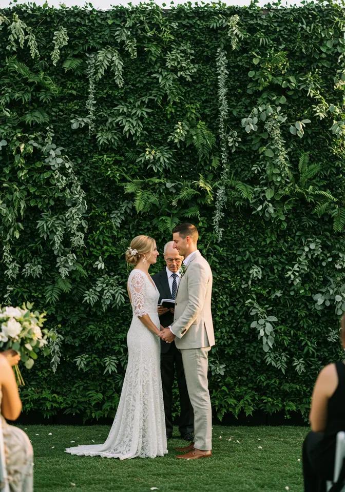 Greenery wedding backdrop outdoors