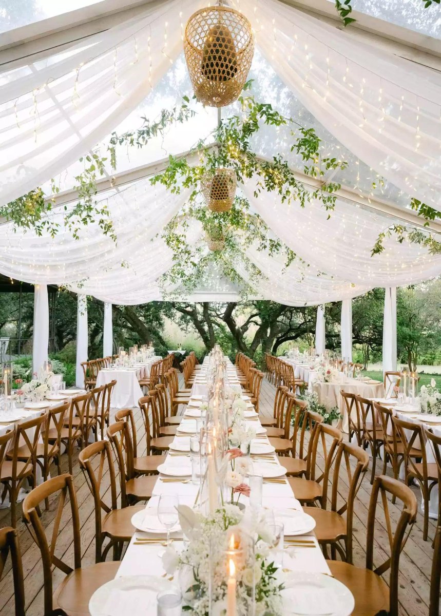 Elegant backyard wedding tent drapery setup