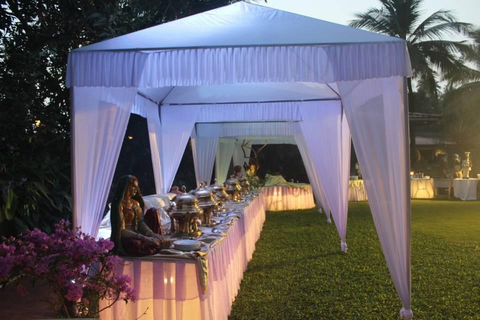 Outdoor wedding buffet protection setup