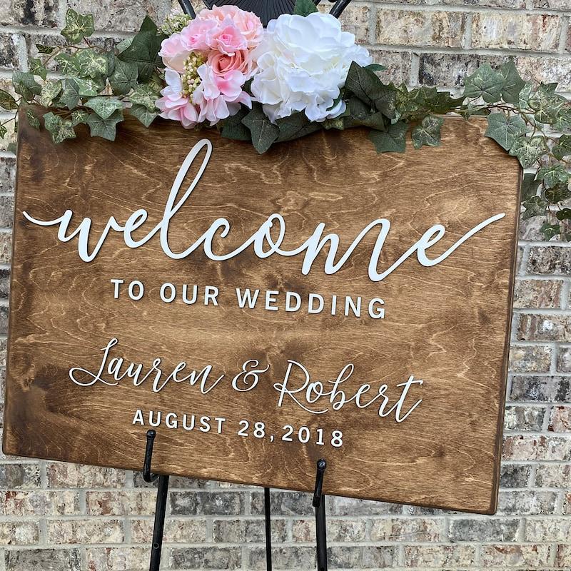 Handmade wedding welcome sign on easel