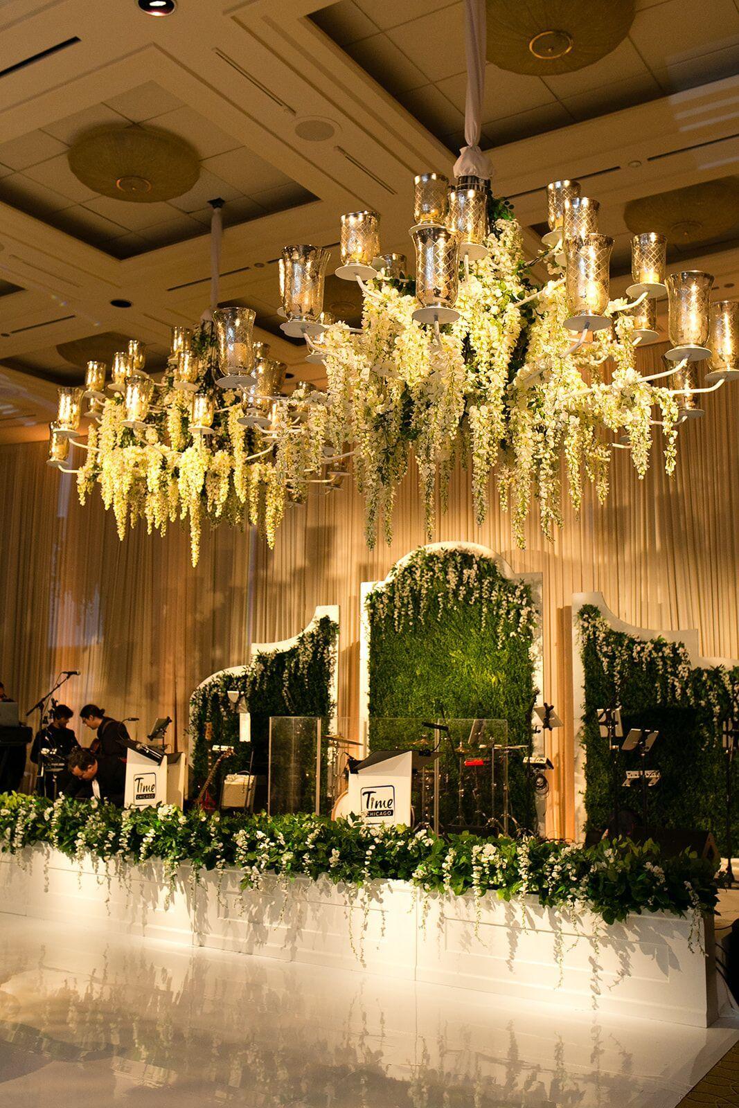 Hanging candle chandelier at wedding reception
