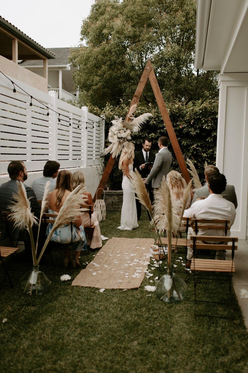 Intimate boho ceremony seating outdoors