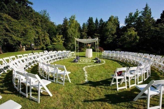 Circular seating at backyard wedding ceremony