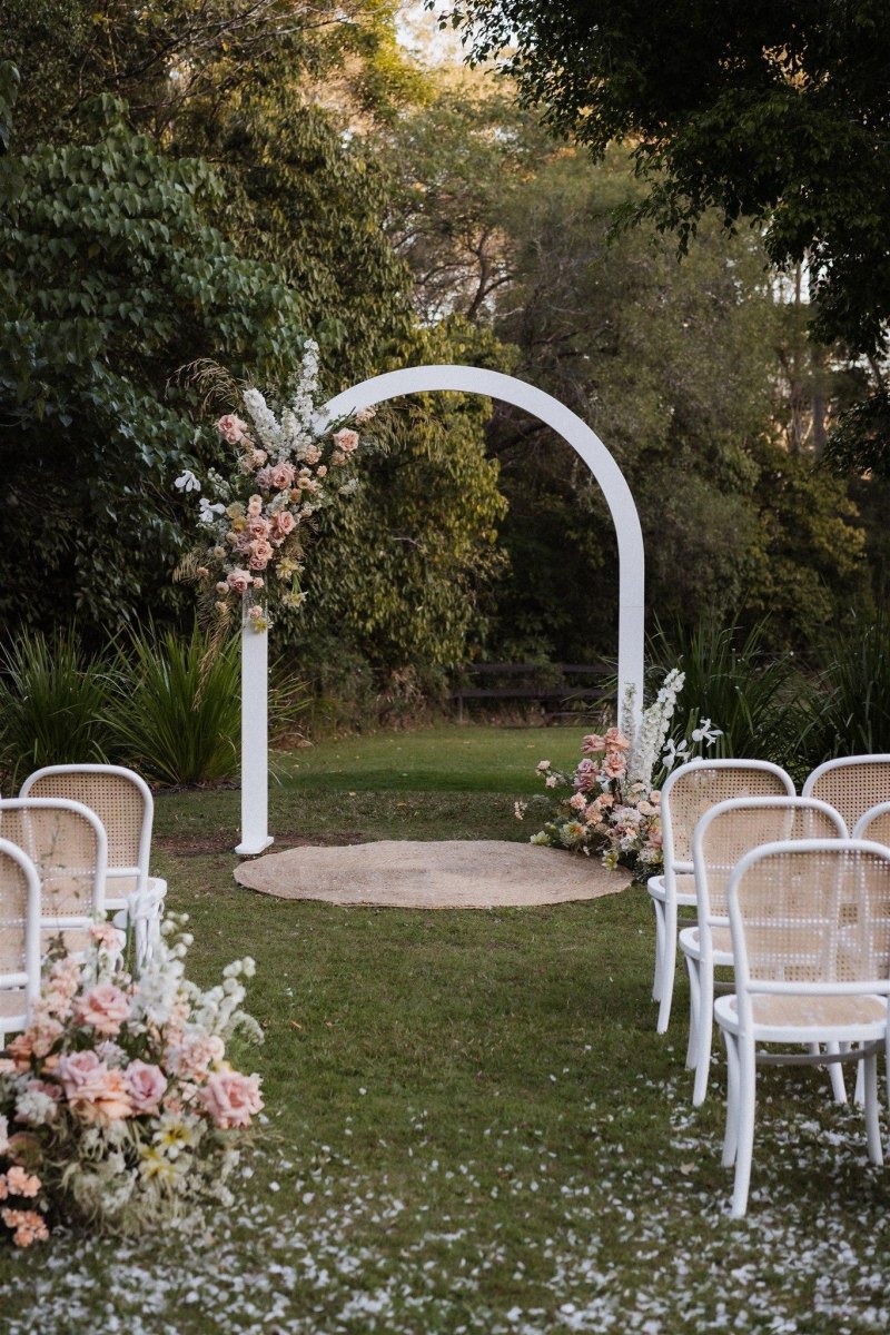 Minimalist backyard wedding arch