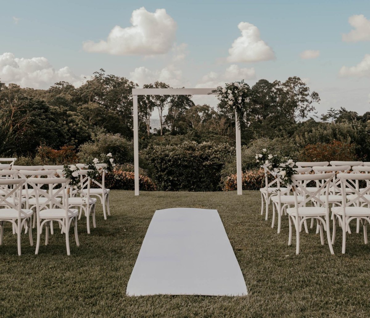Minimalist white backyard wedding decor