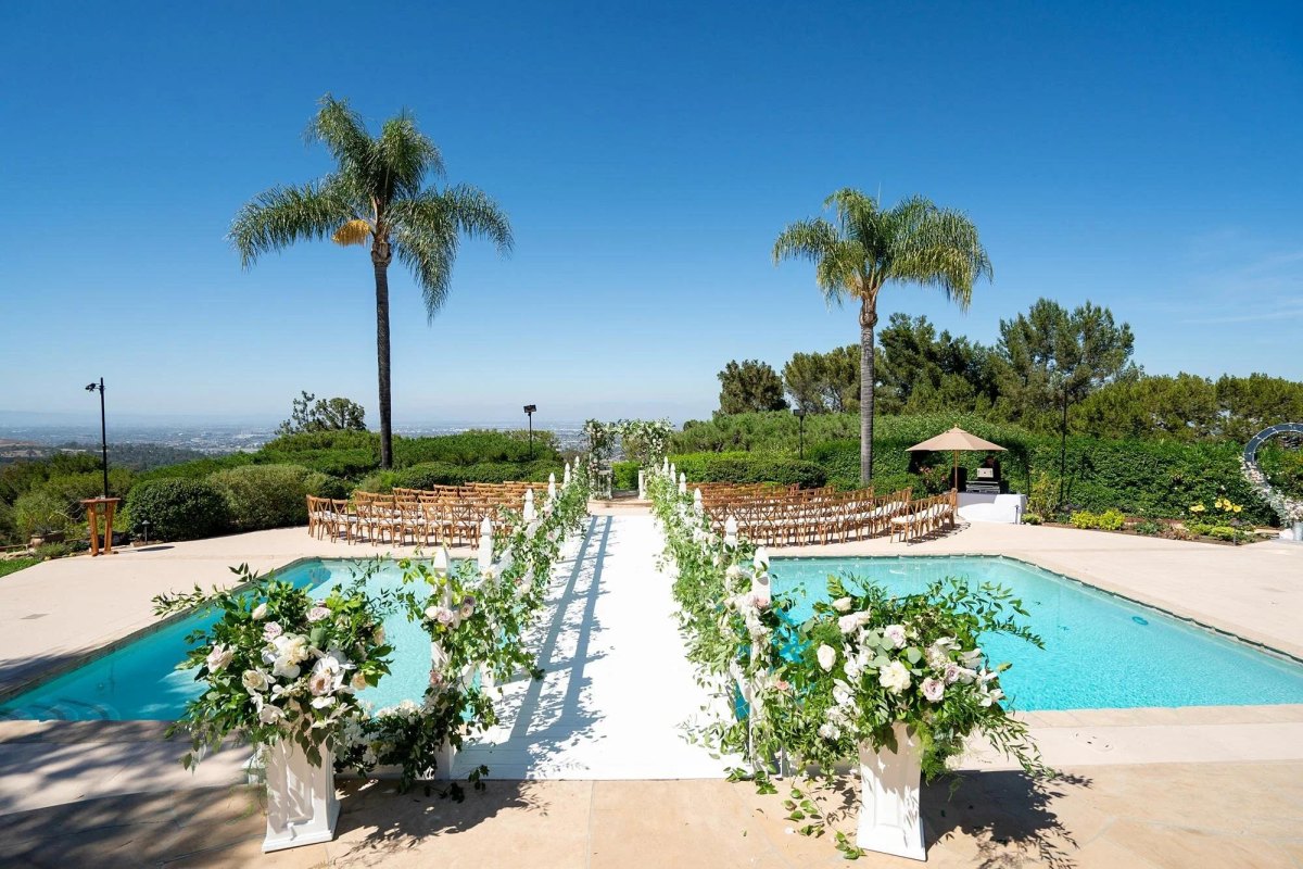 Poolside backyard wedding ceremony setup