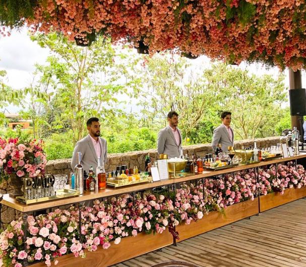 Elegant garden wedding bar setup