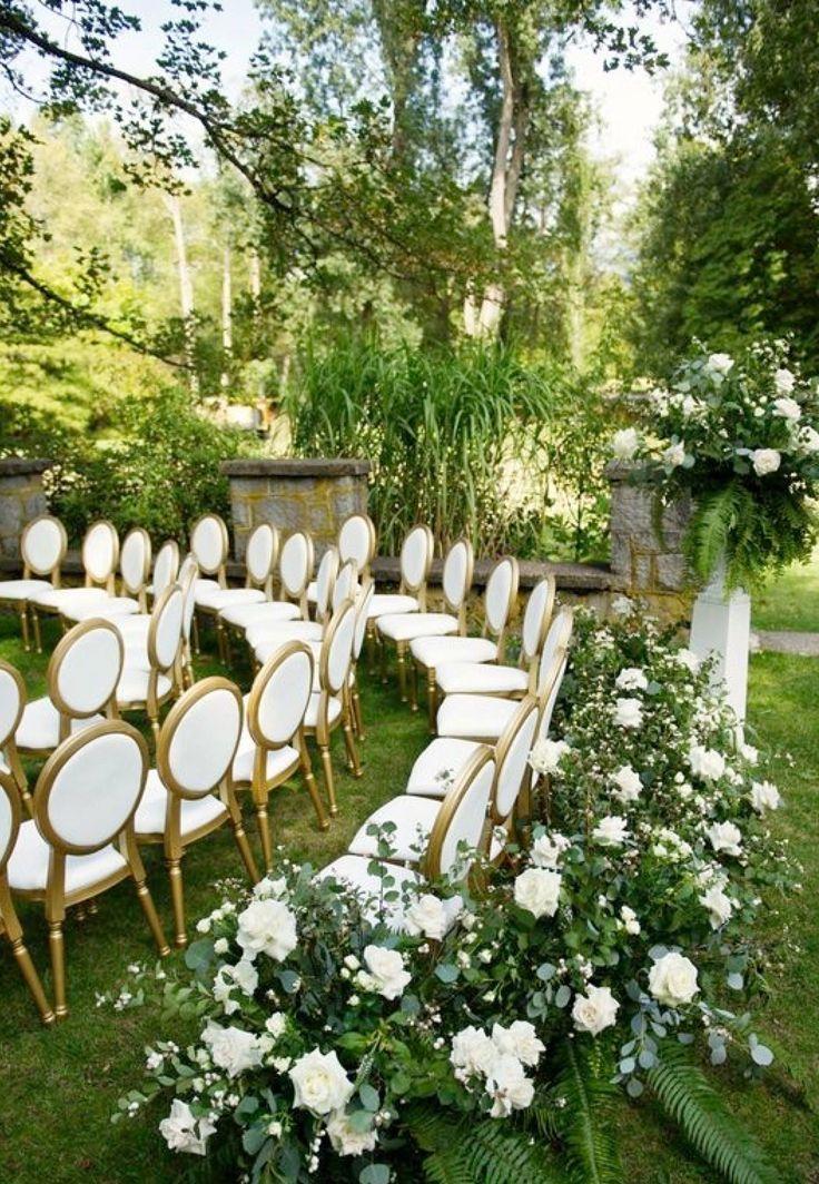 Outdoor garden wedding seating arrangement