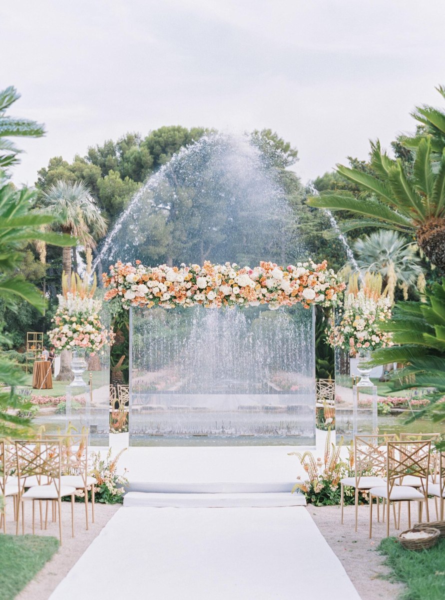 Wedding ceremony with water feature backdrop