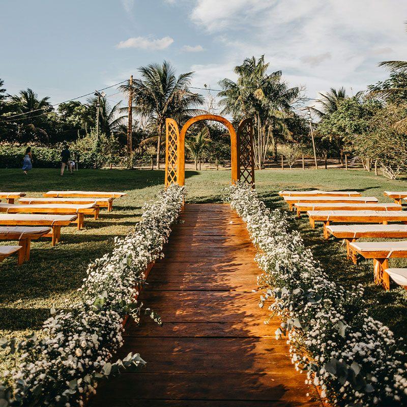 Rustic wooden aisle at outdoor wedding