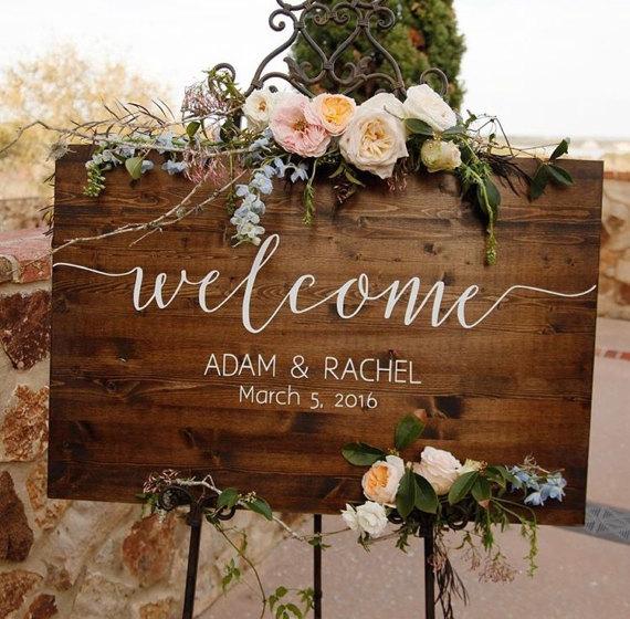 Rustic wooden wedding welcome sign