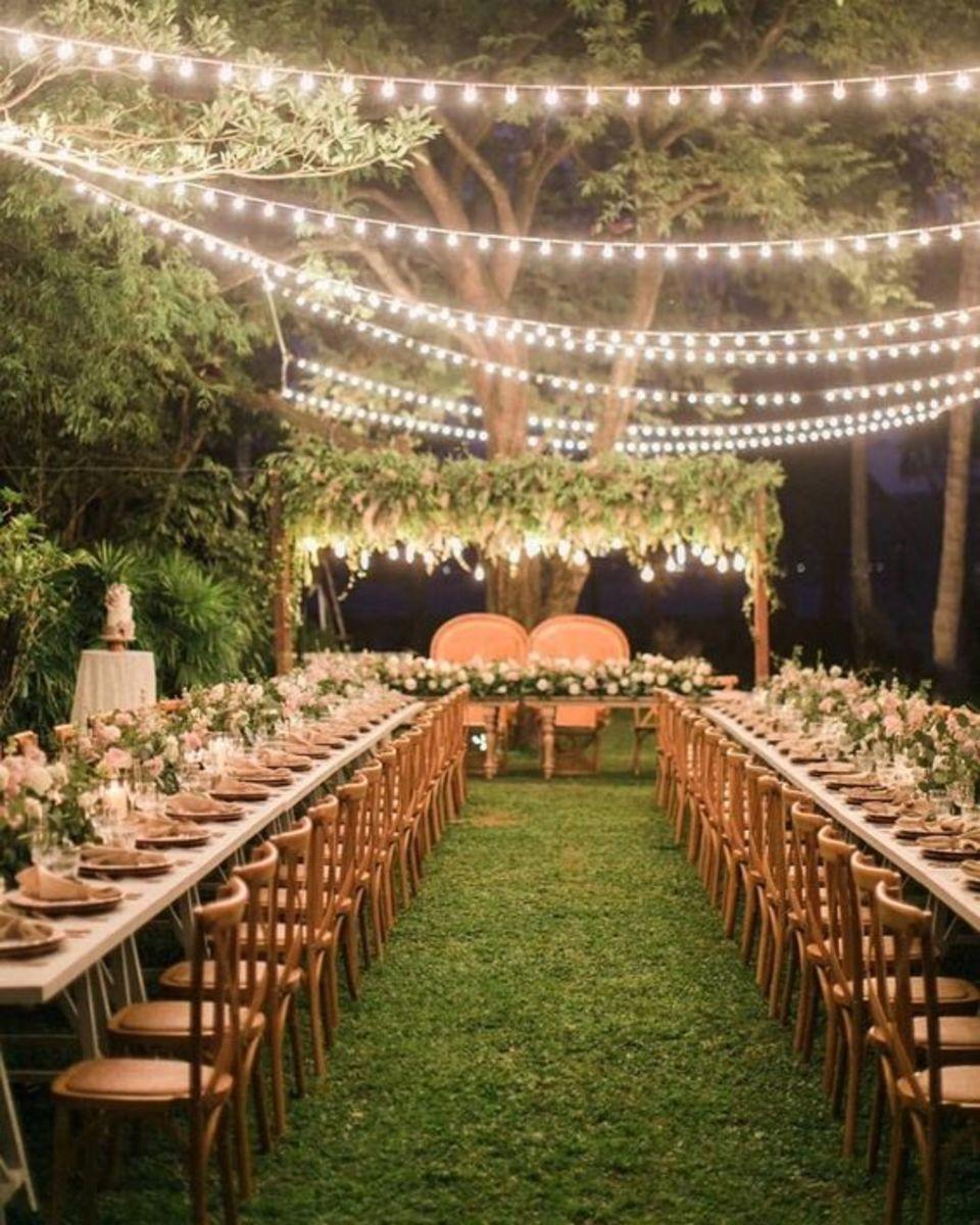 Backyard wedding with string lights