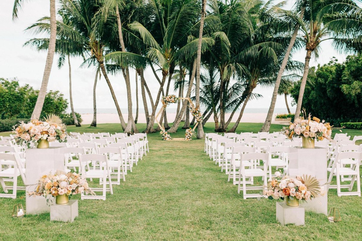 Tropical wedding ceremony palm trees